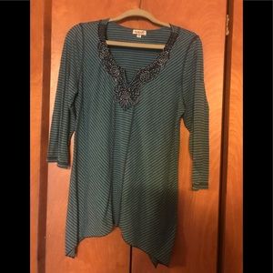 One World shark bite hem top